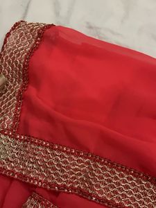 Elegant Red Saree with Embellished Border