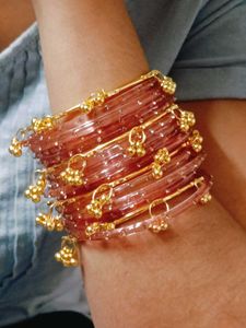 Elegant Glass Bangles with Golden Accents