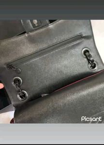Chanel Classic Flap Bag - Black Lambskin