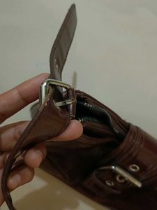 brown sling bag