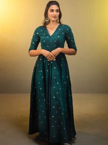 Elegant Teal Gown with Gold Dots