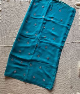Turquoise Saree with Silver Embellishments