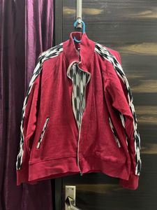 Red Zip-Up Jacket with Graphic Accents
