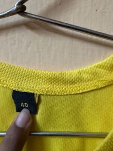 yellow jersey with shorts