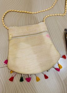 Embroidered Clutch with Tassels