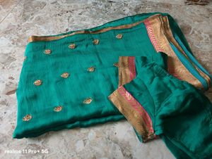 Elegant Teal Saree with Gold Embroidery