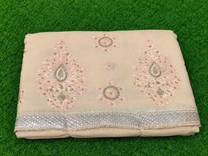 Elegant Cream Embroidered Saree