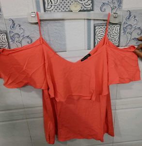Coral coloured chic and elegant top