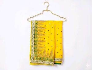Vibrant Yellow Embroidered Saree with matching blo