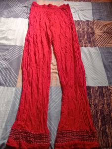 Vibrant Red Palazzo Pants with Lace Detail