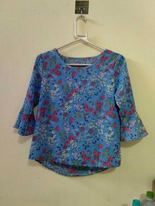 Blue floral ditsy- print top. (Material: Not sure)