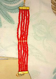 Red Beaded Bracelet with Kundan Charm
