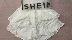 White Broderie Anglaise Romper