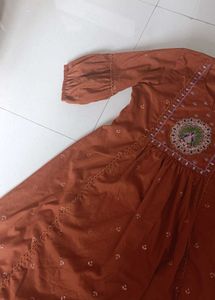 Orange Kurta with Peacock Embroidery