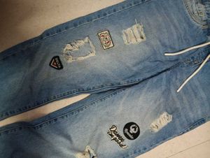 Distressed Patch Jeans