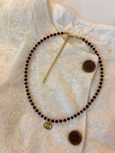 Elegant Beaded Necklace with Charm
