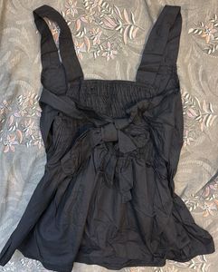 Chic Black Peplum Top with Lace Trim