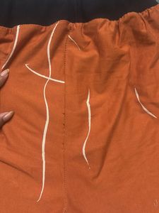 Trendy Orange Abstract Print Shorts