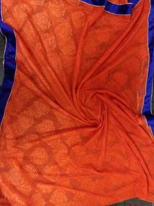 Vibrant Orange Saree with Royal Blue Border