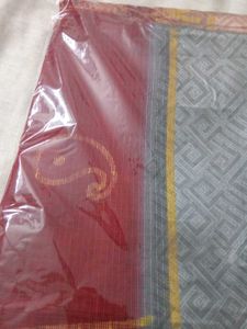 Elegant Maroon &amp; Gold Patterned Saree