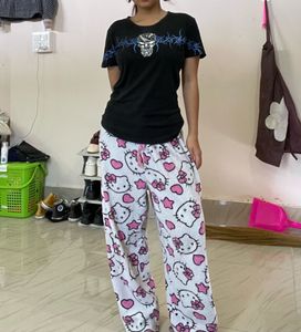 Hello Kitty pant and goth top combo