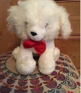 Adorable White Plush Dog Toy with Red Bow