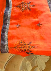 Vibrant Orange Embroidered Saree