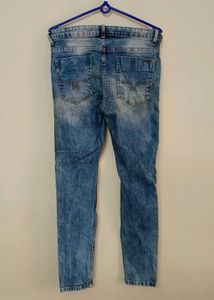 Women's Distressed Blue Jeans