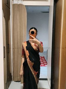 Elegant Black Saree with Red Blouse