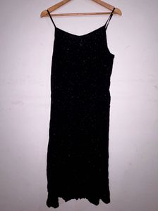 Black shiny polka dot dress