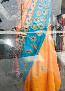 Vibrant Orange & Teal Saree