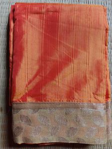 Price Drop 🥳 Flowy and shiny orange saree wit