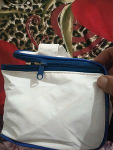 White Travel Pouch with Blue Trim