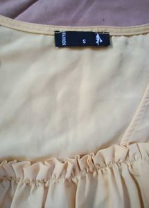 coquette butter yellow ruffle top