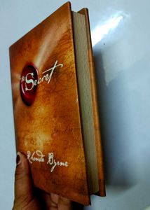 The Secret by Rhonda Byrne Book (hard cover).