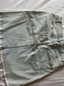 Light Wash Distressed Denim Mini Skirt