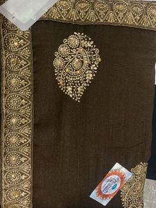 Elegant Brown Saree with Intricate Gold Embroidery