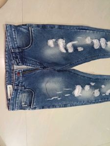 Distressed Blue Skinny Jeans