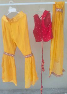 Vibrant Yellow Flared sharara and red choli duppat