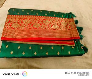 Elegant Green Saree with Red & Gold Border