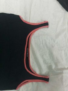 Chic Black Crop Top with Pink Trim
