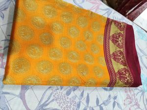 Vibrant Yellow Saree with Peacock Motif