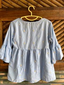 Light Blue Embroidered Peplum Top
