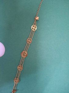 Elegant Gold Bracelet with Charm