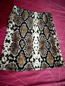 Sassy Style Snake Print Mini Skirt, featuring a hi