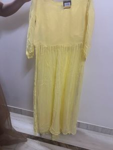Elegant Yellow Kurta Set with Intricate Work