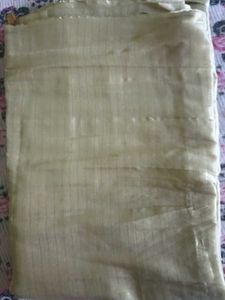 Elegant Gold Striped Fabric with Tassel Trim