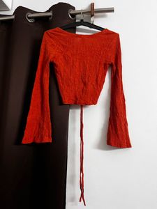 rust orange flared sleeve top