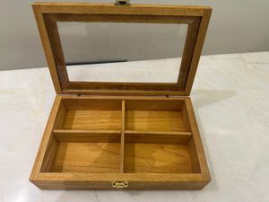 Woodenstorage box with glass lid