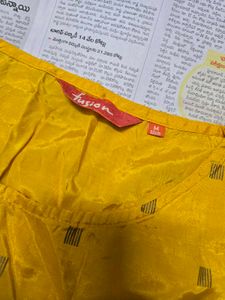 Vibrant Yellow Printed Aline Top.